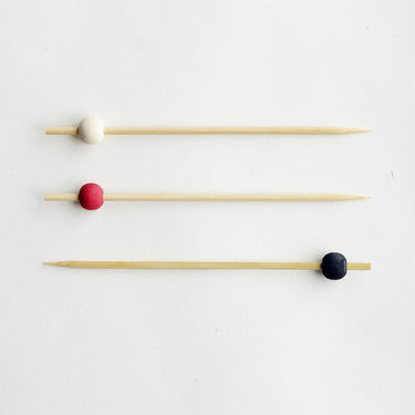 Bamboo skewer with white, red & black bead 12cm length
