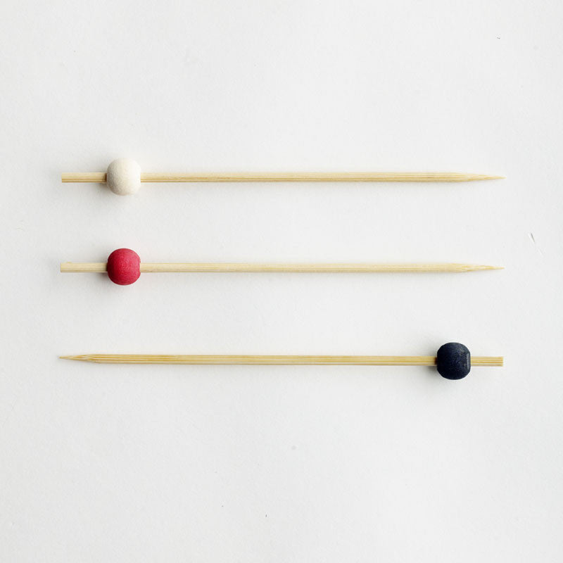 Bamboo skewer with white, red & black bead 12cm length 